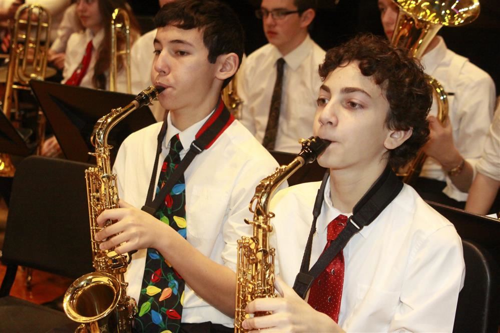 Students in band playing horns